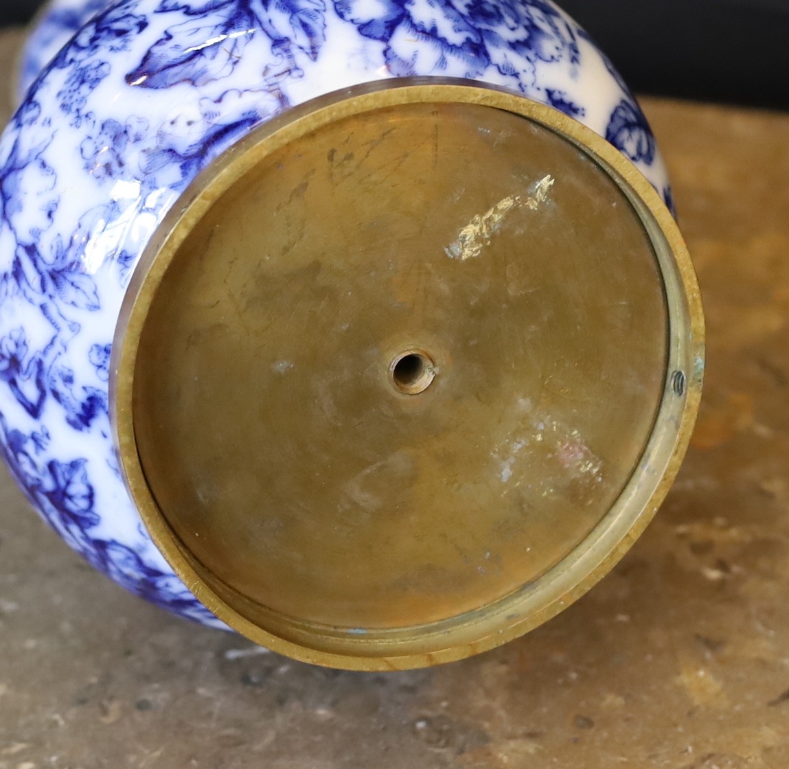 A Victorian mounted blue and white ceramic lamp base, height 38cm